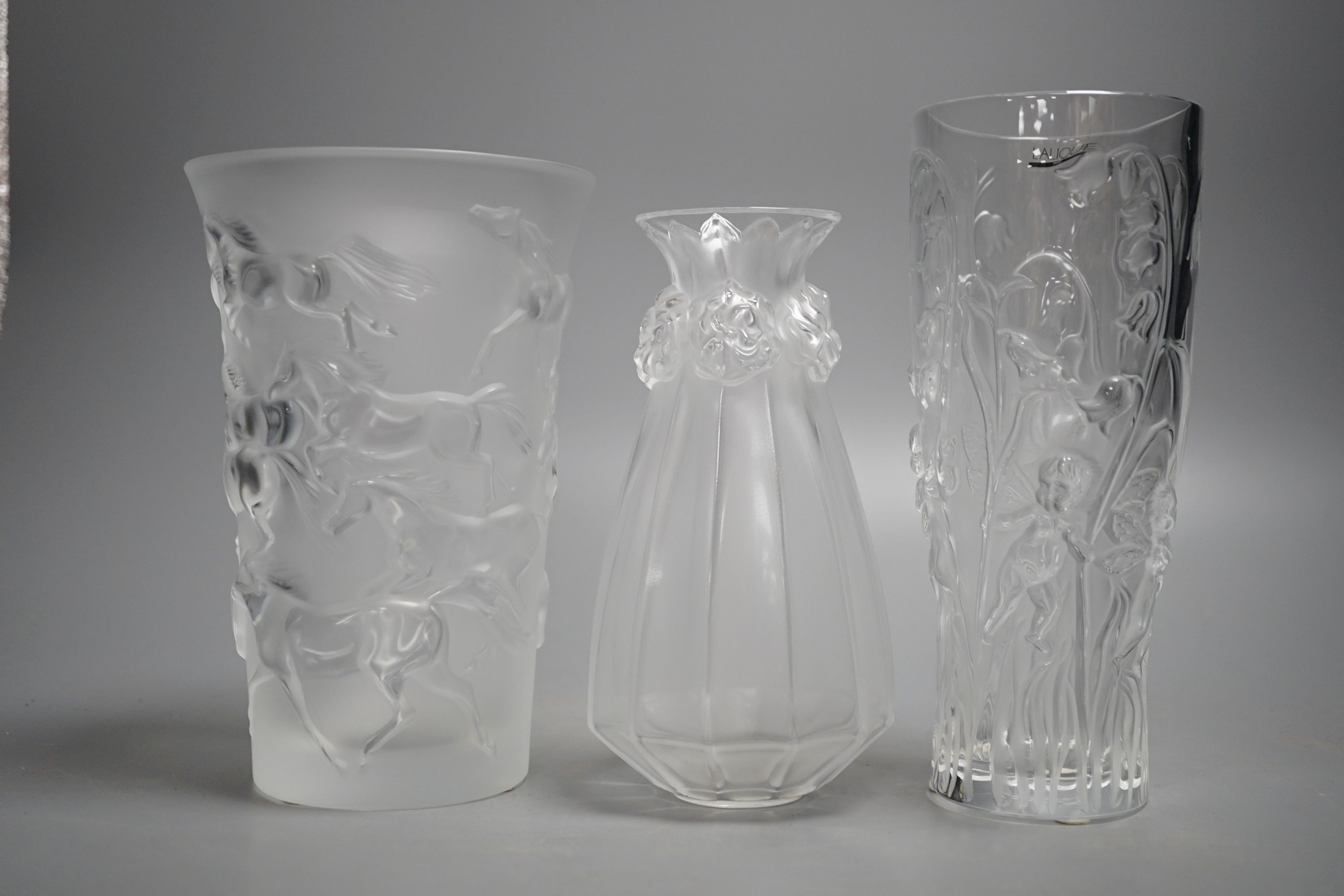Three modern Lalique frosted glass vases - Oeillets (Carnations), Mustang and Elves pattern, tallest 20cm